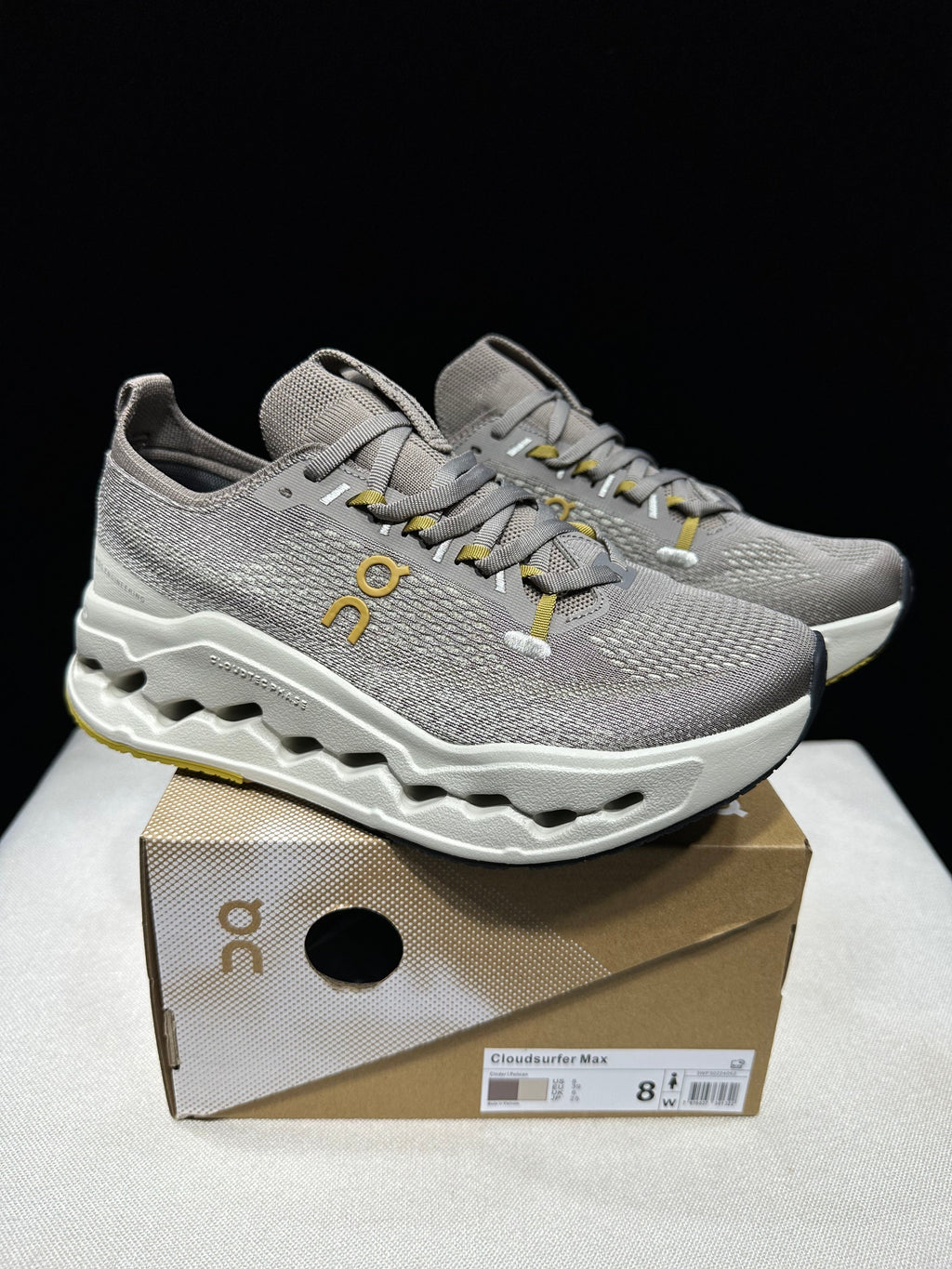 On Cloudsurfer Max Running Sneakers in Gray Beige - product image from the listing.
