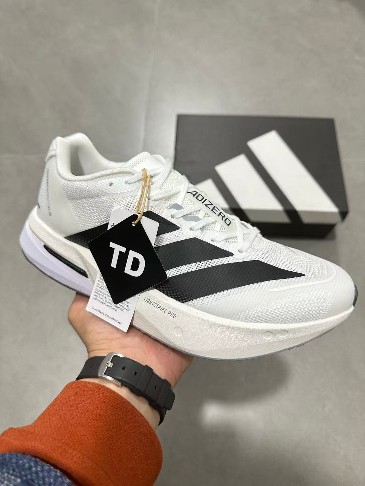 adidas Adizero Lightstrike Pro Running Shoes in White Black JS4939 - product image from the listing.