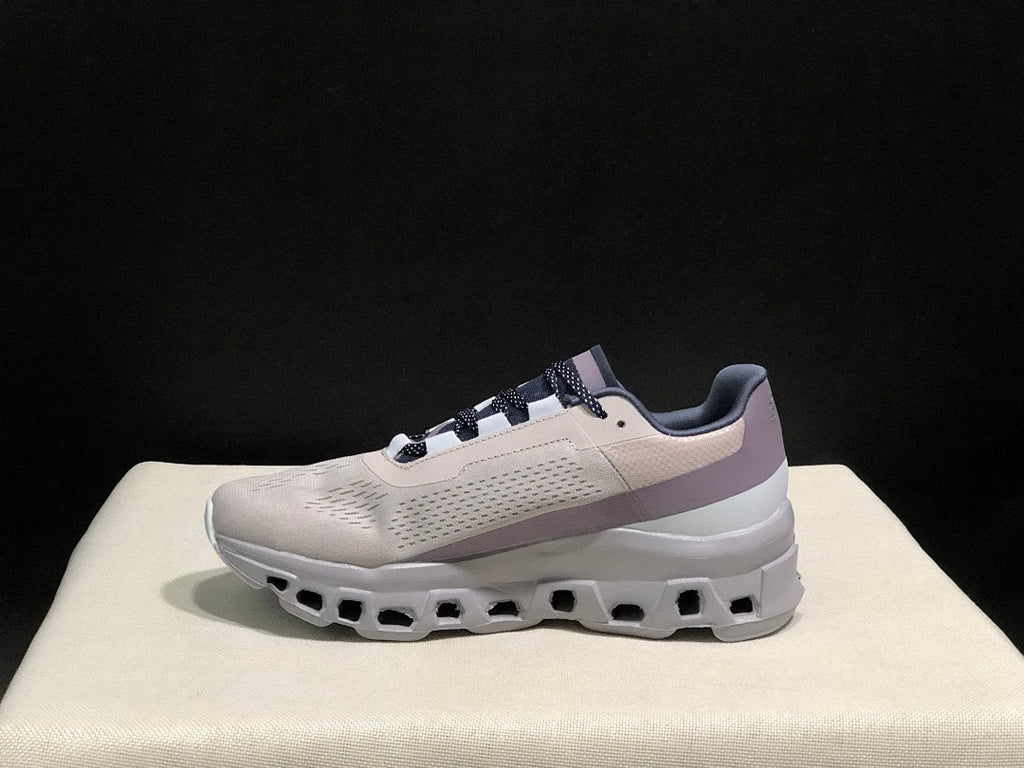 Gray and Purple On Cloudmonster Sneakers - product image from the listing.