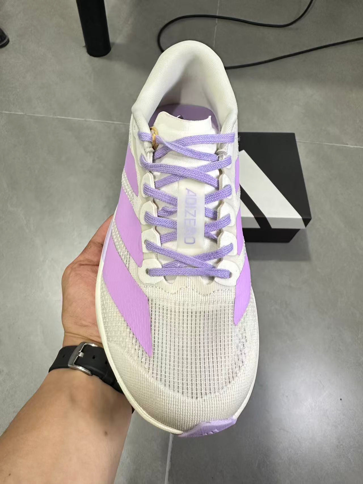 adidas Lightstrike Pro Running Shoes in White Purple KI7354 - product image from the listing.