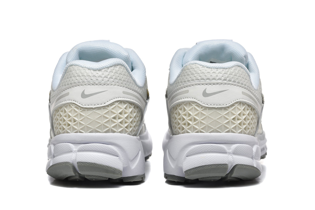 White and Silver Nike Vomero 5 Sneakers - product image from the listing.