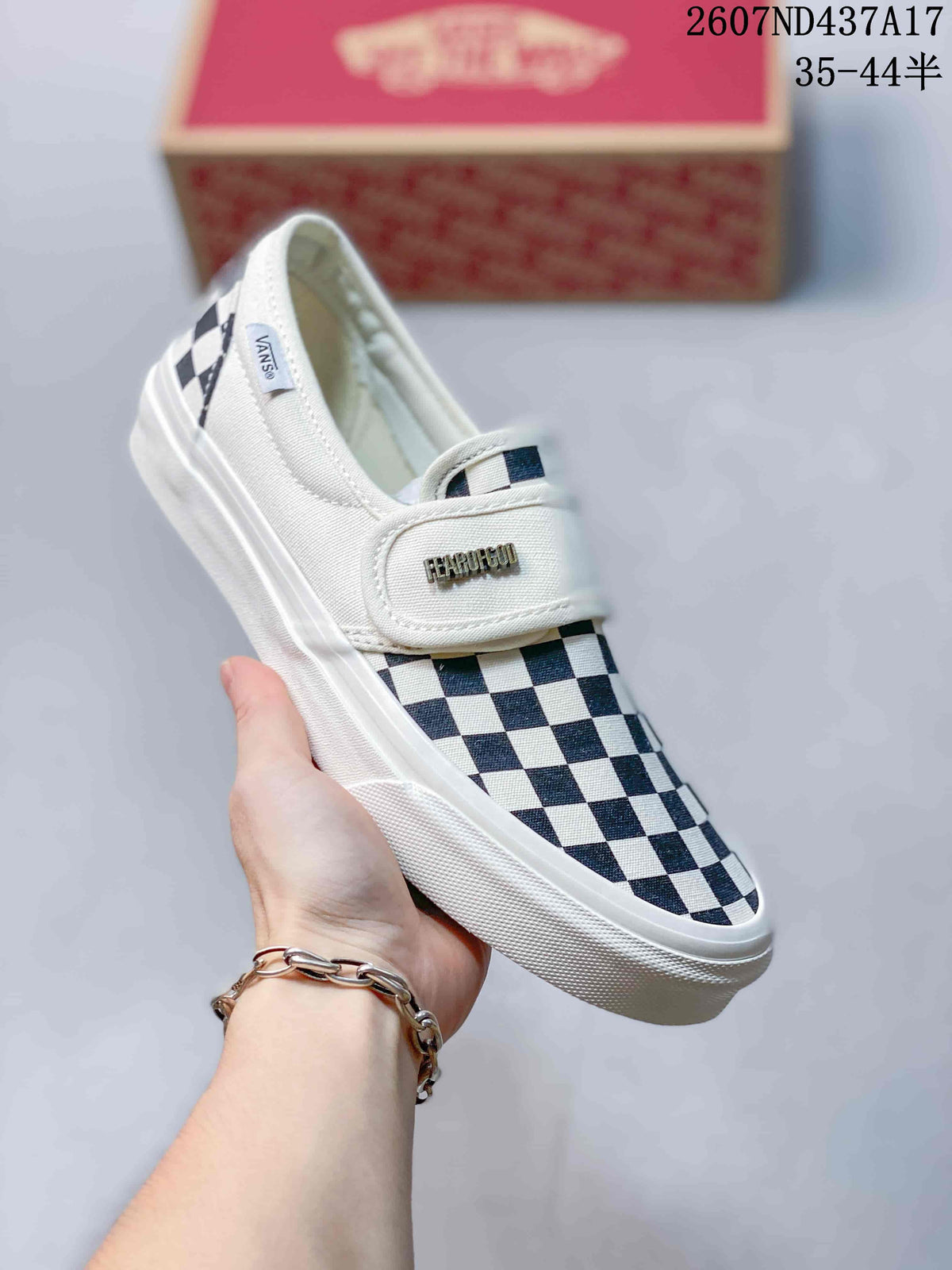 Vans Slip-On Trainers in Red/Navy and Checkerboard - product image from the listing.
