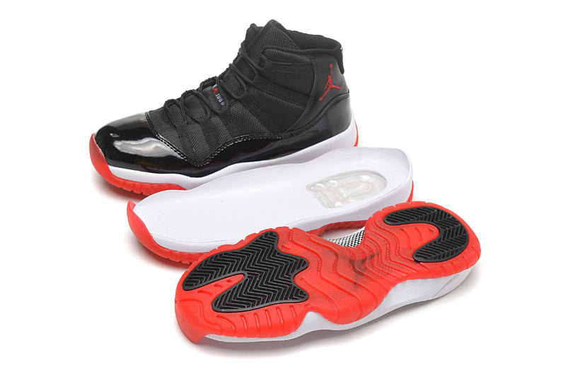 Air Jordan 11 Retro High Basketball Sneakers in Black Red - product image from the listing.