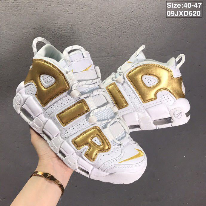 Nike Air More Uptempo Sneakers in White and Metallic Gold - product image from the listing.