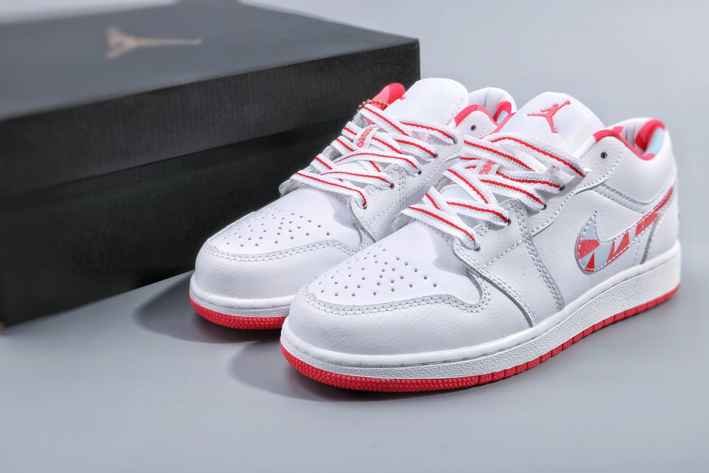 Women's Nike Air Jordan 1 Low White and Pink Sneakers - product image from the listing.