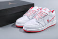 Women's Nike Air Jordan 1 Low White and Pink Sneakers - product image from the listing.