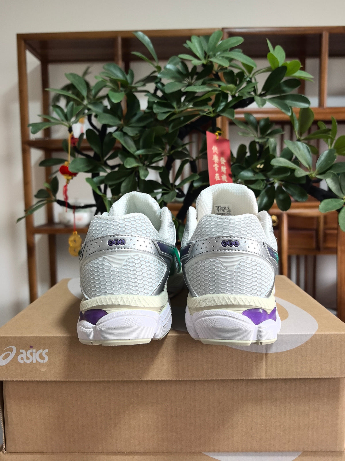 Grey and White ASICS GEL-Cumulus 16 Sneakers - product image from the listing.
