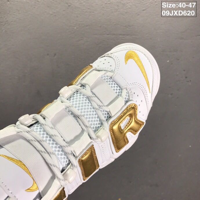 Nike Air More Uptempo Sneakers in White and Metallic Gold - product image from the listing.
