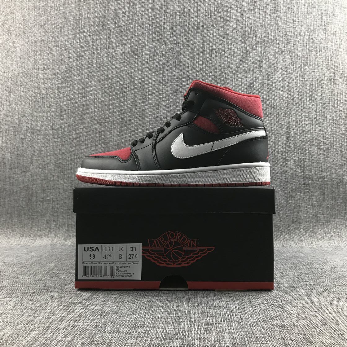 Black Red Canvas-Style Sneakers - Jordan 1 Mid 554724-020 - product image from the listing.