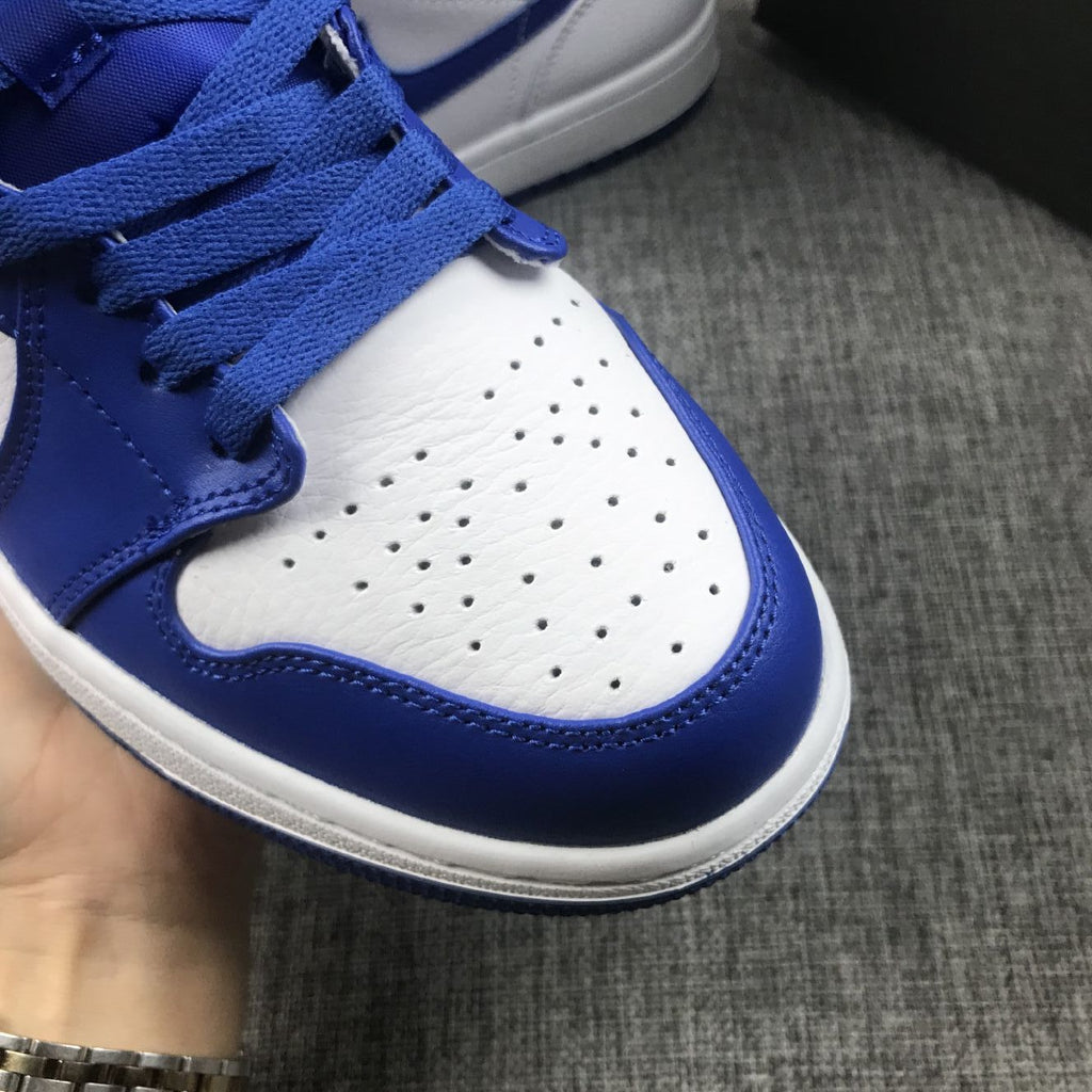 Hyper Royal Sneakers, White and Blue, - Jordan 1 Mid 554724-114 - product image from the listing.