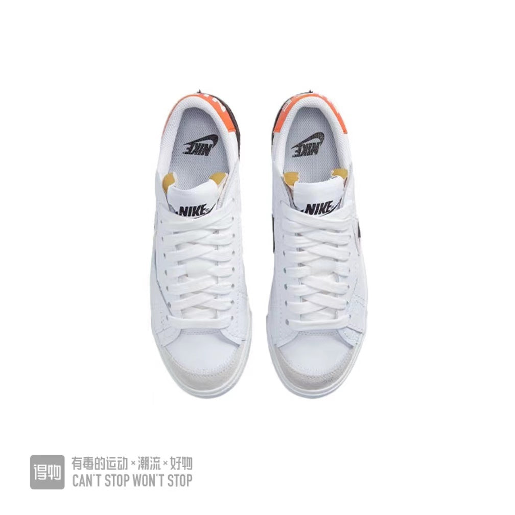 Nike Blazer Low 07 Sneakers in White Orange Black - product image from the listing.