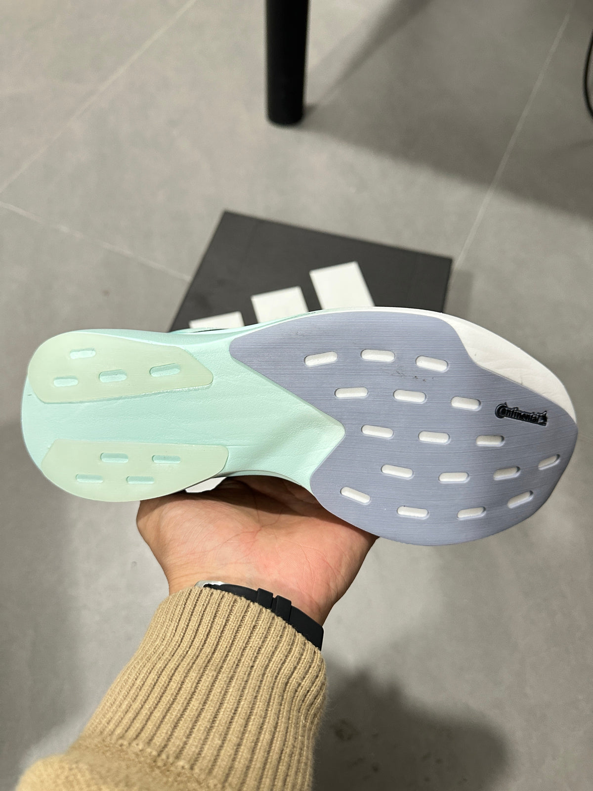 White and Mint adidas Adizero Lightweight Running Shoes - product image from the listing.