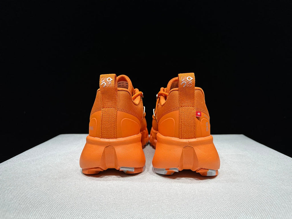 On x Loewe Cloudsurfer Orange Trail Trainers - product image from the listing.