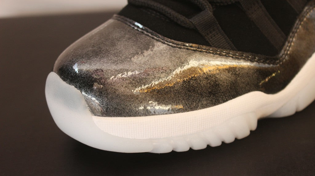 Air Jordan 11 Low Barons Black Sneakers - product image from the listing.