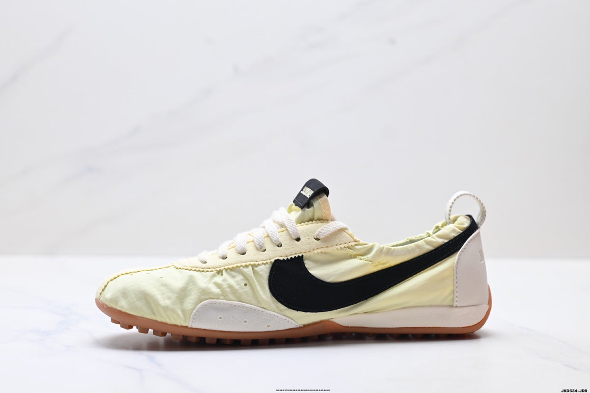 Pale Yellow and Black Nike x Jacquemus Sneakers - product image from the listing.