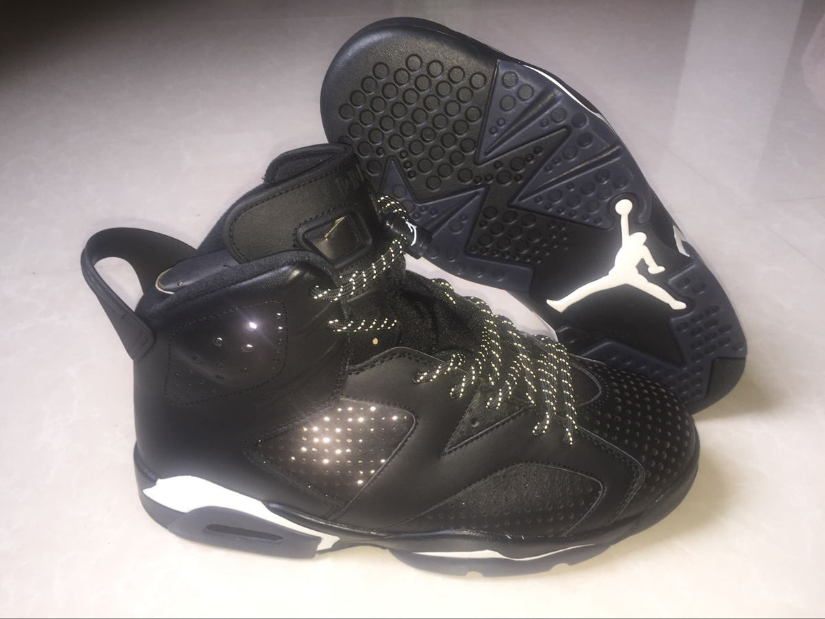 Jordan 6 Retro Black Cat High-Top Sneakers in Black and White - product image from the listing.