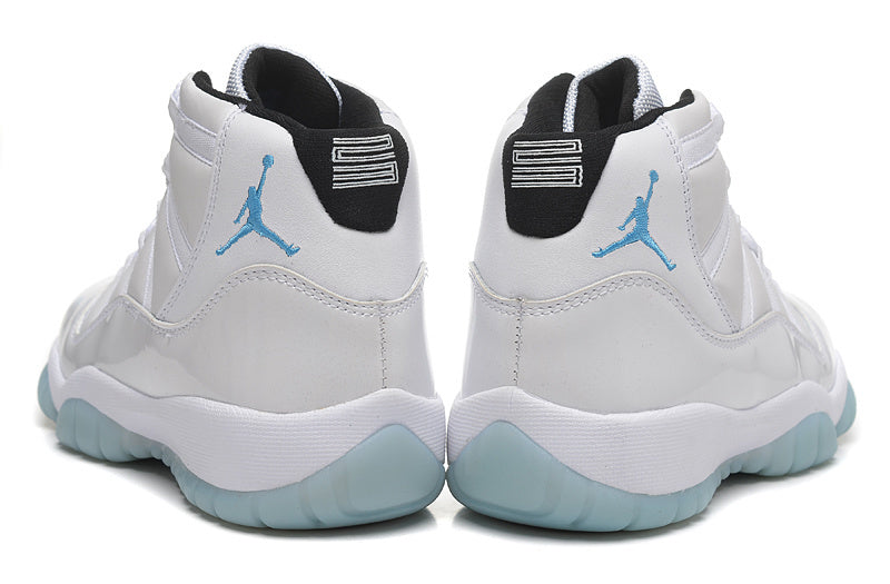 Air Jordan 11 Retro High-Top Sneakers in White and Blue - product image from the listing.