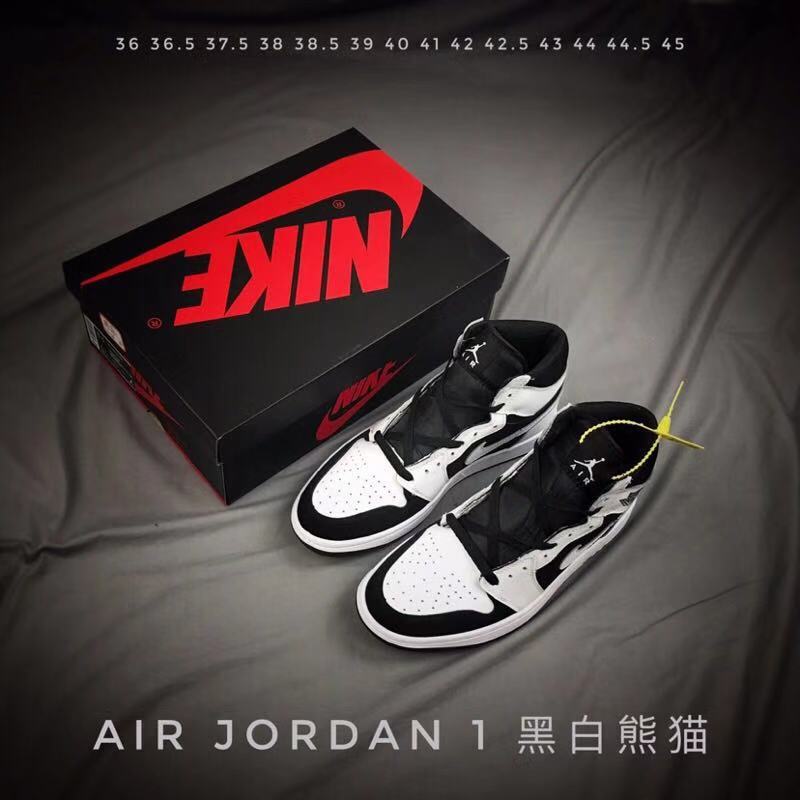 Air Jordan 1 High Sneakers in Black and White - product image from the listing.