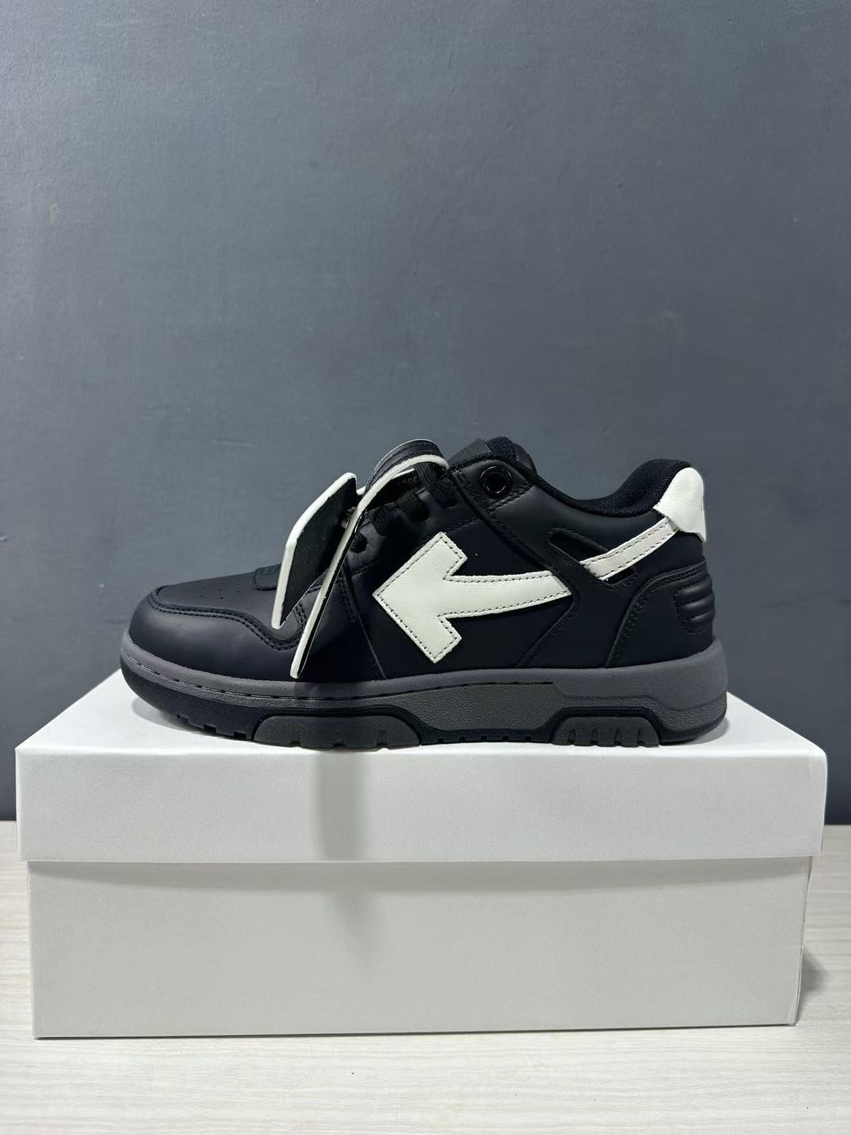 Off-White Out Of Office Low-Top Sneakers in Black White OWIA189C99LEA0061001 - product image from the listing.