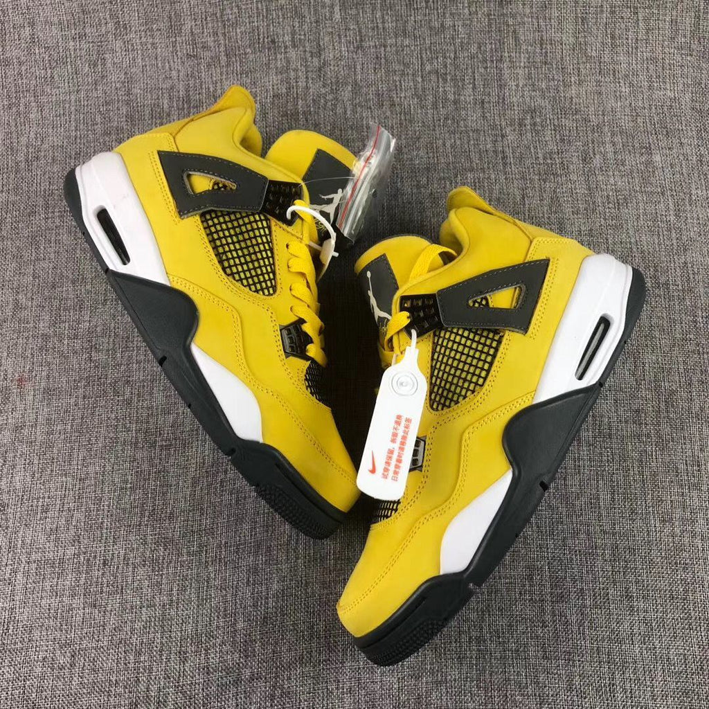 Air Jordan 4 Lightning Yellow Black Sneakers - product image from the listing.