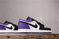 Air Jordan 1 Low Sneakers in White Black Orange Purple 553558-125 - product image from the listing.