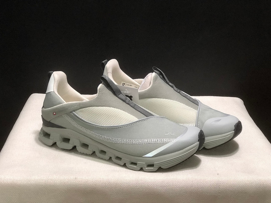On Cloud 4 Coast Slip-On Sneakers, in Dark Grey - product image from the listing.