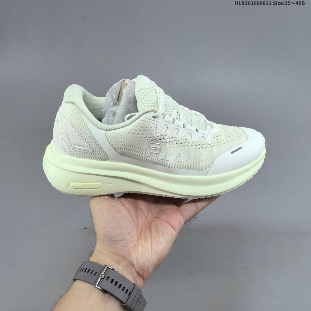 Ivory FILA Pebble Sandal Sneakers - product image from the listing.