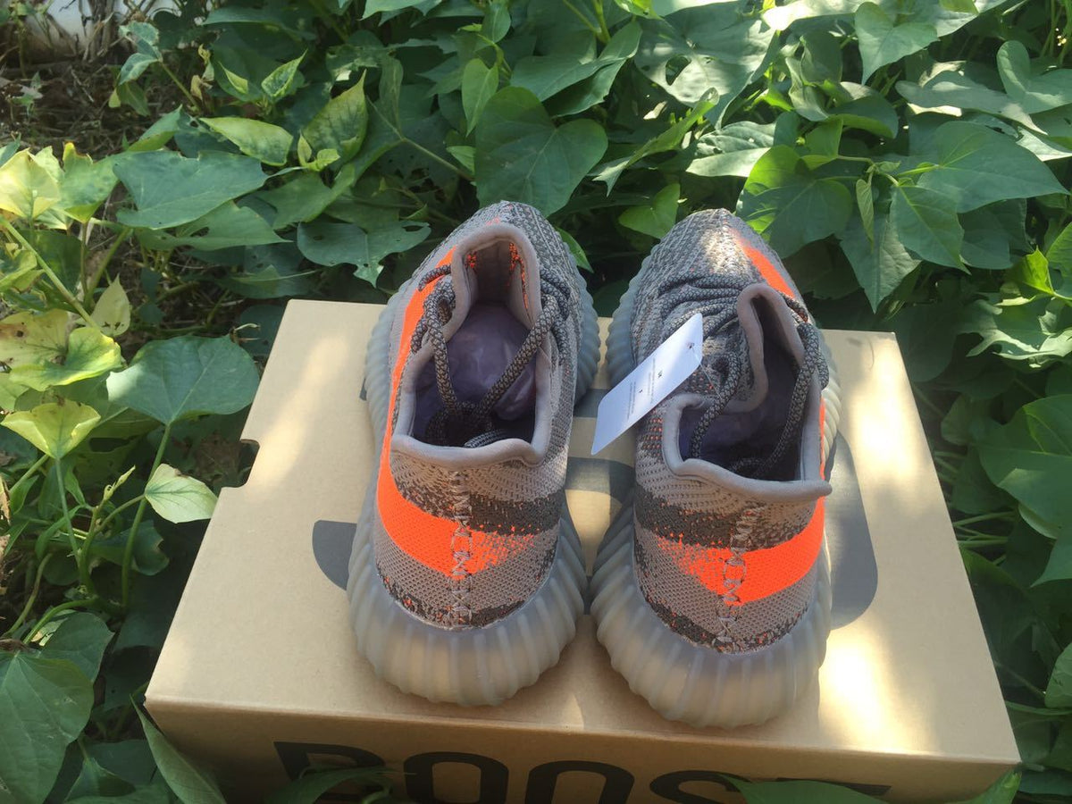 Yeezy 350 V2 Sneakers in Gray and Orange Knit - product image from the listing.
