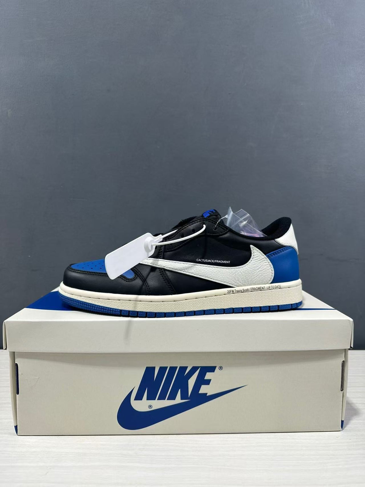Air Jordan 1 Low Travis Scott Fragment Black Blue Sneakers - product image from the listing.