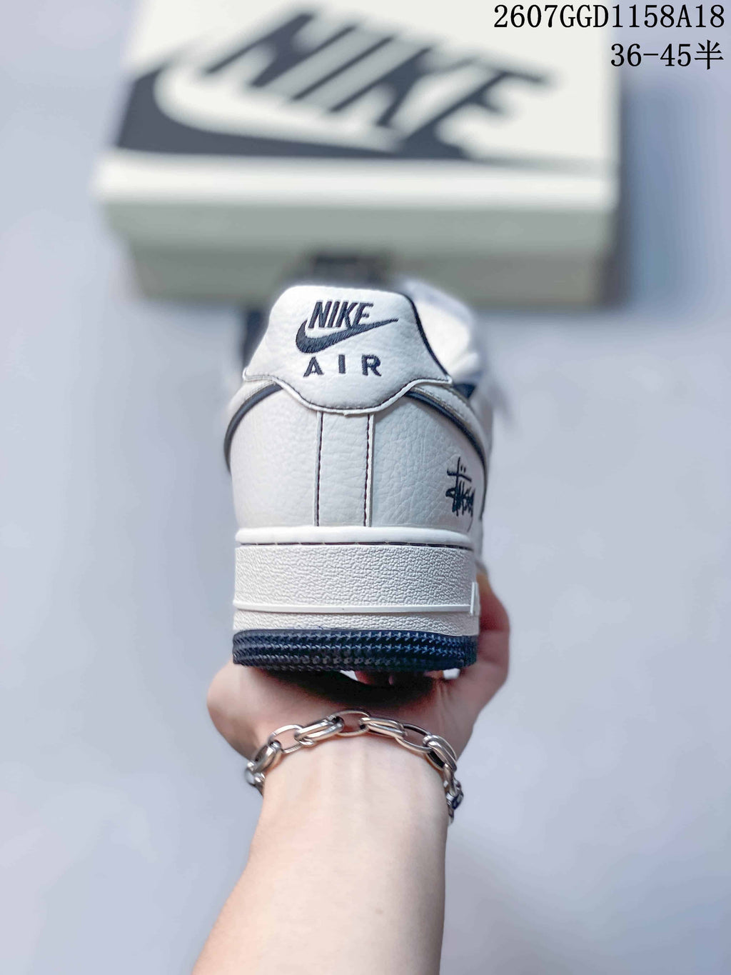 Nike Air Force 1 '07 Low-Top Sneakers in White Navy - product image from the listing.