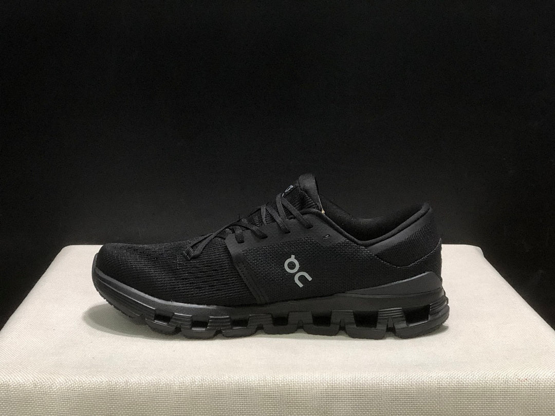 On Cloud X 4 Black Eclipse Trainers - product image from the listing.