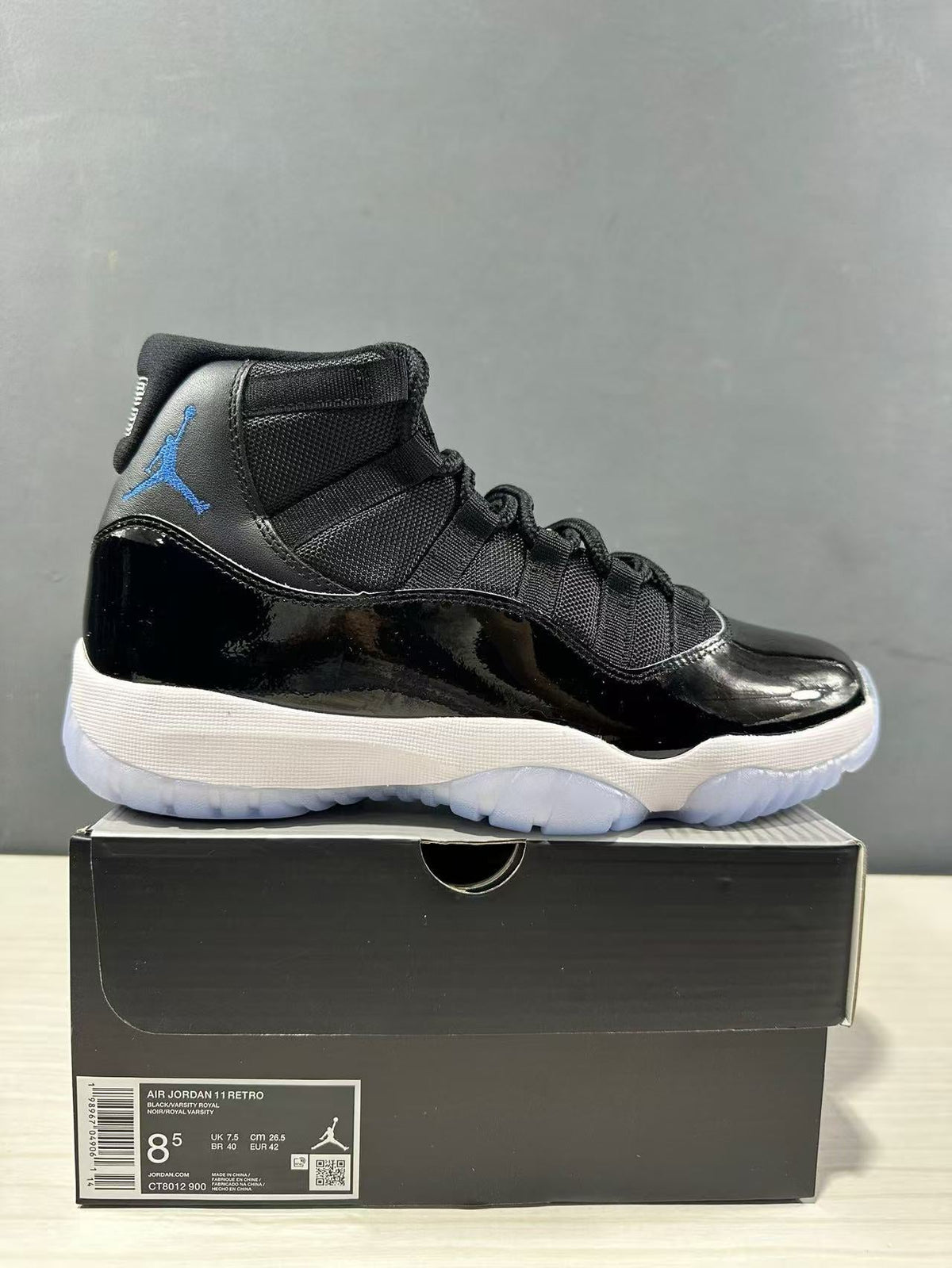 Air Jordan 11 Retro High Sneakers Black Blue CT8012-900 - product image from the listing.