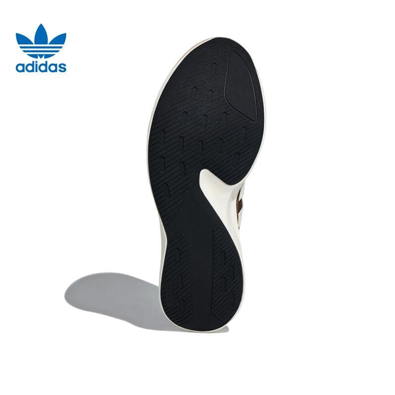 adidas Low-Top Sneakers in Brown and White - product image from the listing.