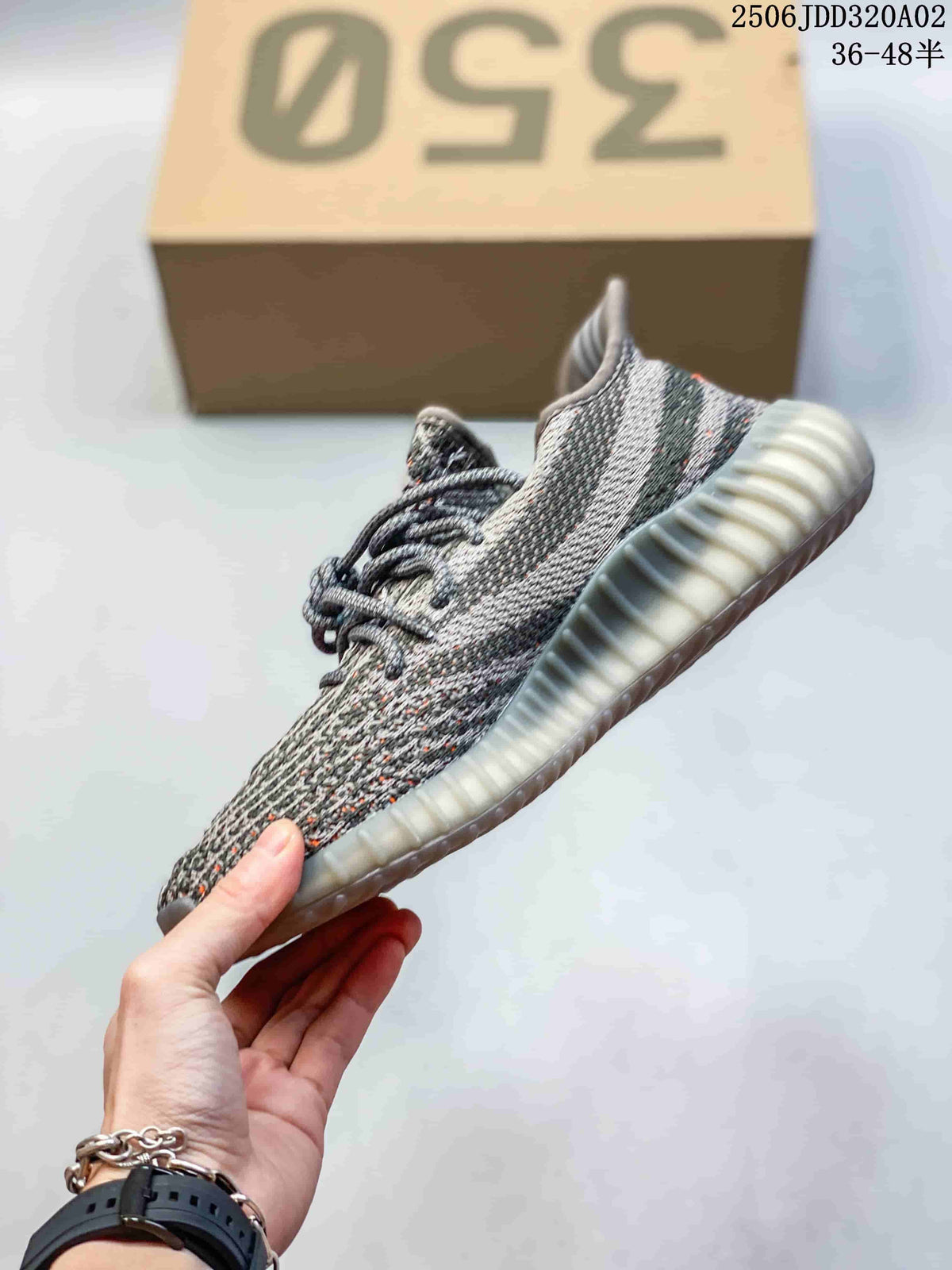 adidas Yeezy Boost 350 Sneakers in Gray Orange - product image from the listing.