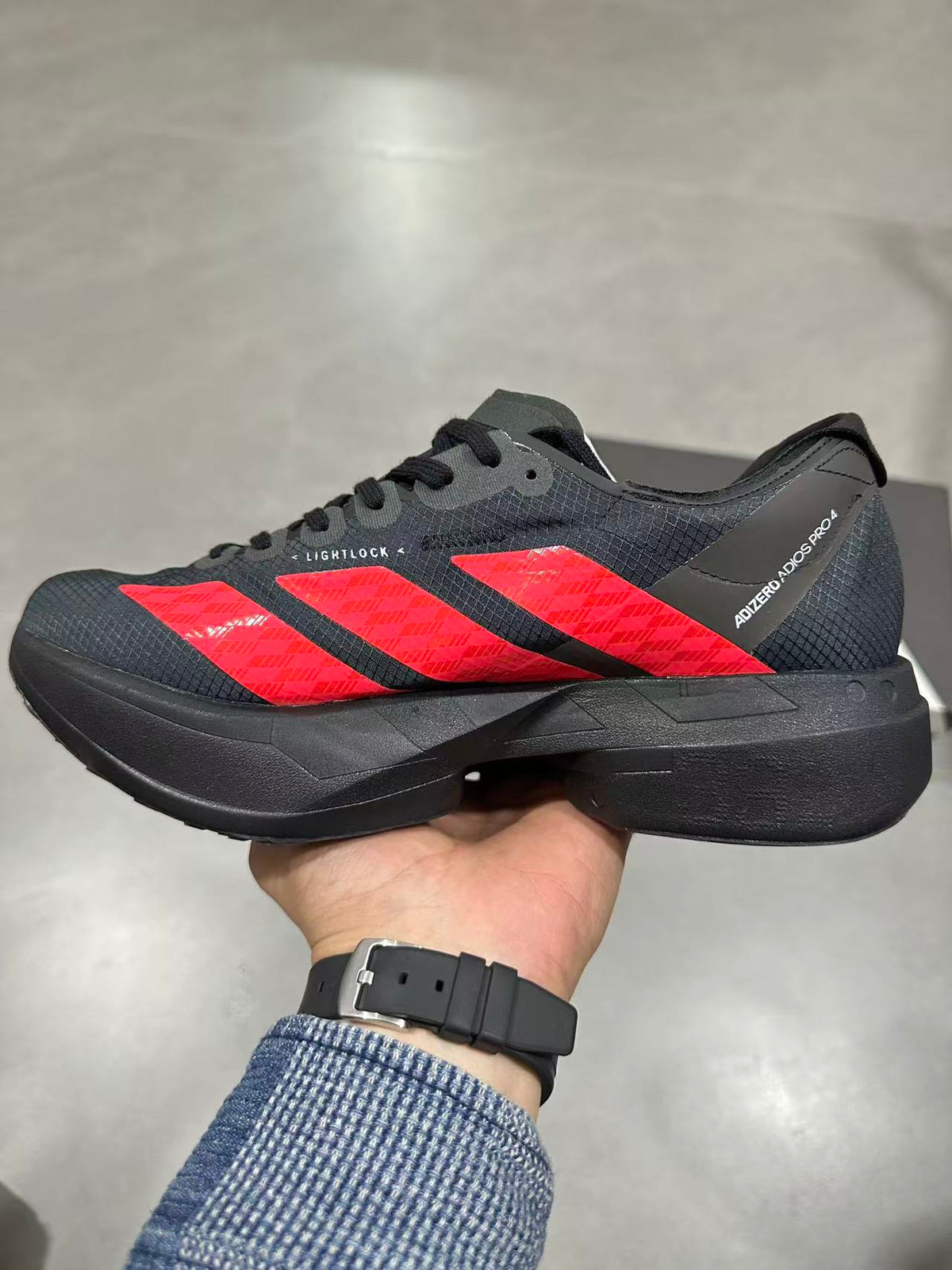 Adidas Lightstrike Pro Running Shoes in Black Red KH8840 - product image from the listing.