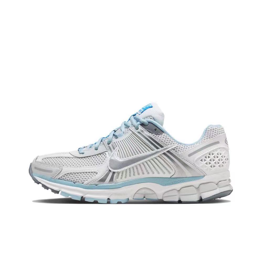 Nike Zoom Vomero 5 Sneakers in White Blue FN3432-001 - product image from the listing.