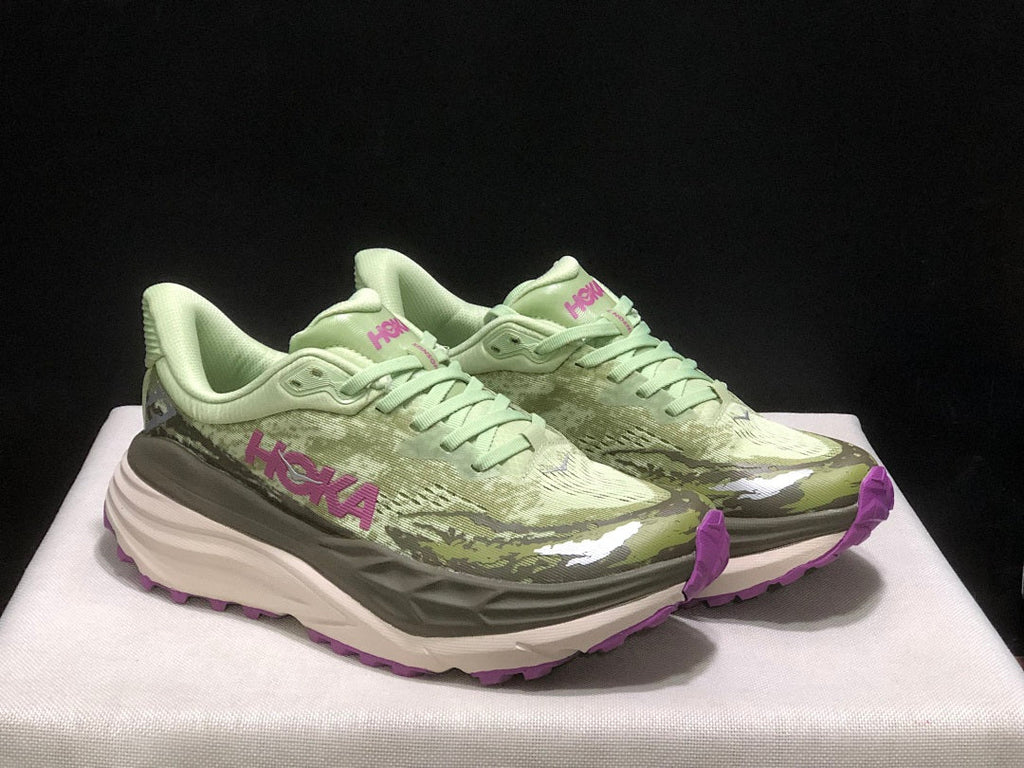 HOKA Stinson 7 Trail Running Shoes in Sage in Green - product image from the listing.
