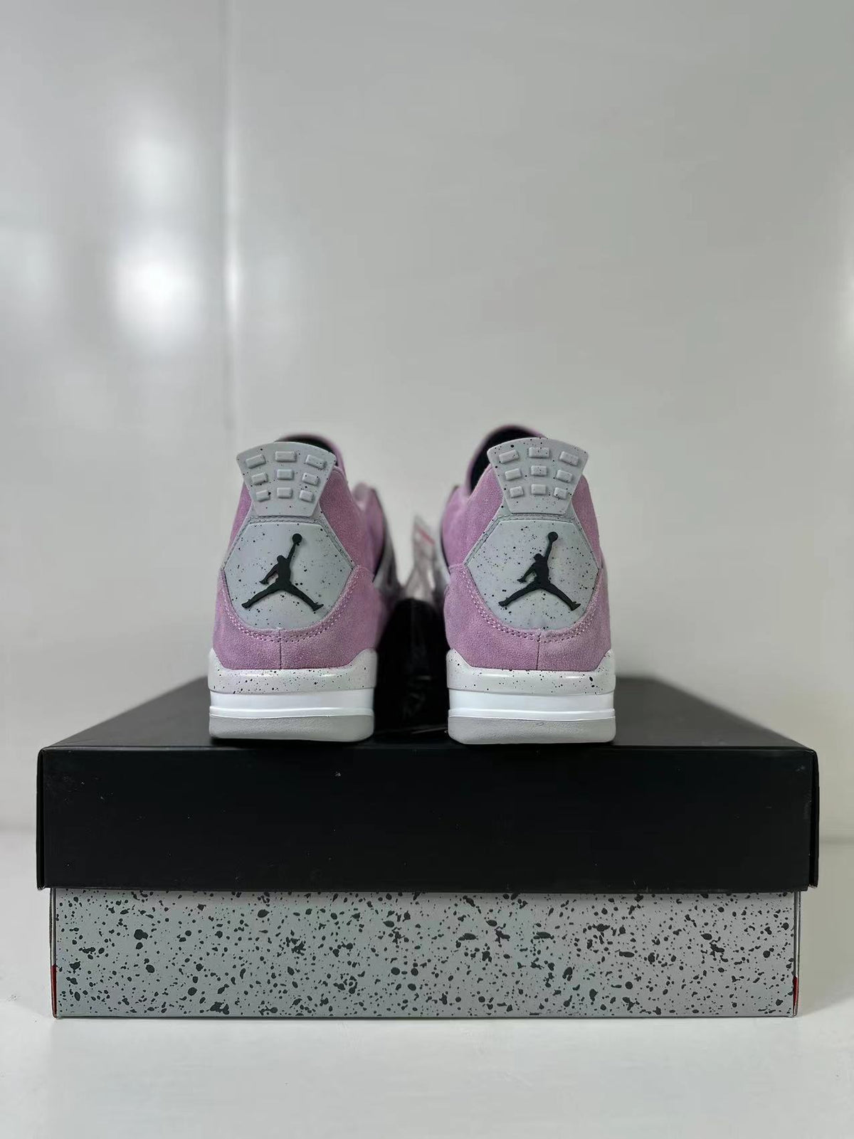 Air Jordan 4 Retro Orchid Pink Sneakers AQ9129-501 - product image from the listing.