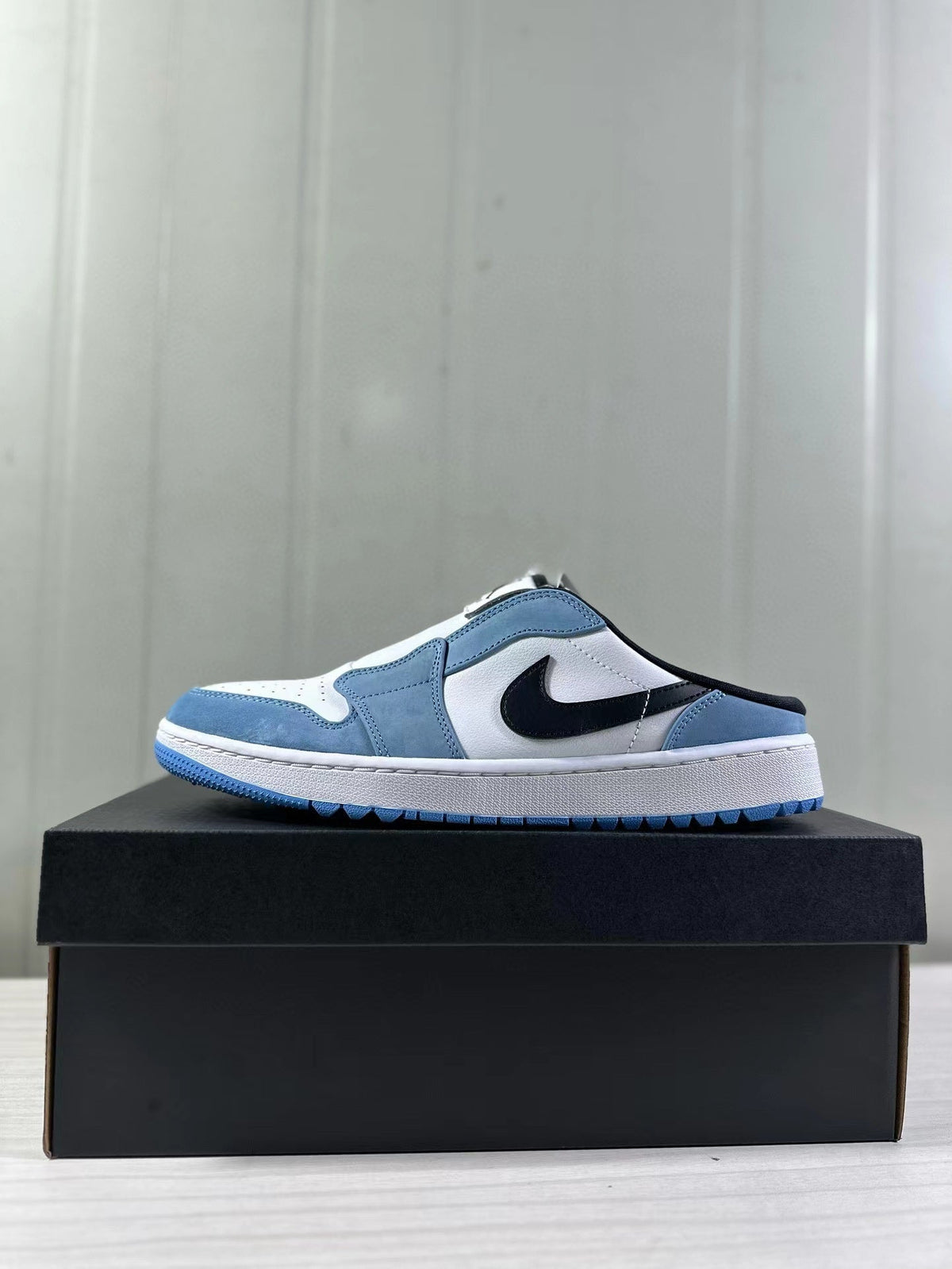 Air Jordan 1 Mule Low Blue White Black FJ1214-400 - product image from the listing.