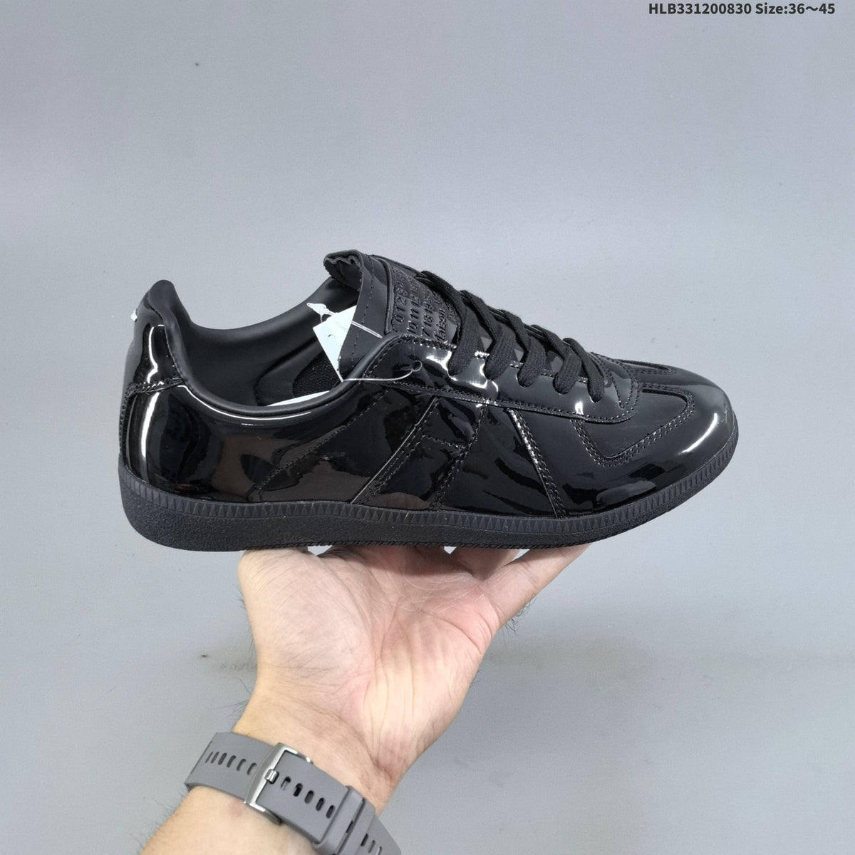 Maison Margiela Replica Low-Cut Sneakers - product image from the listing.