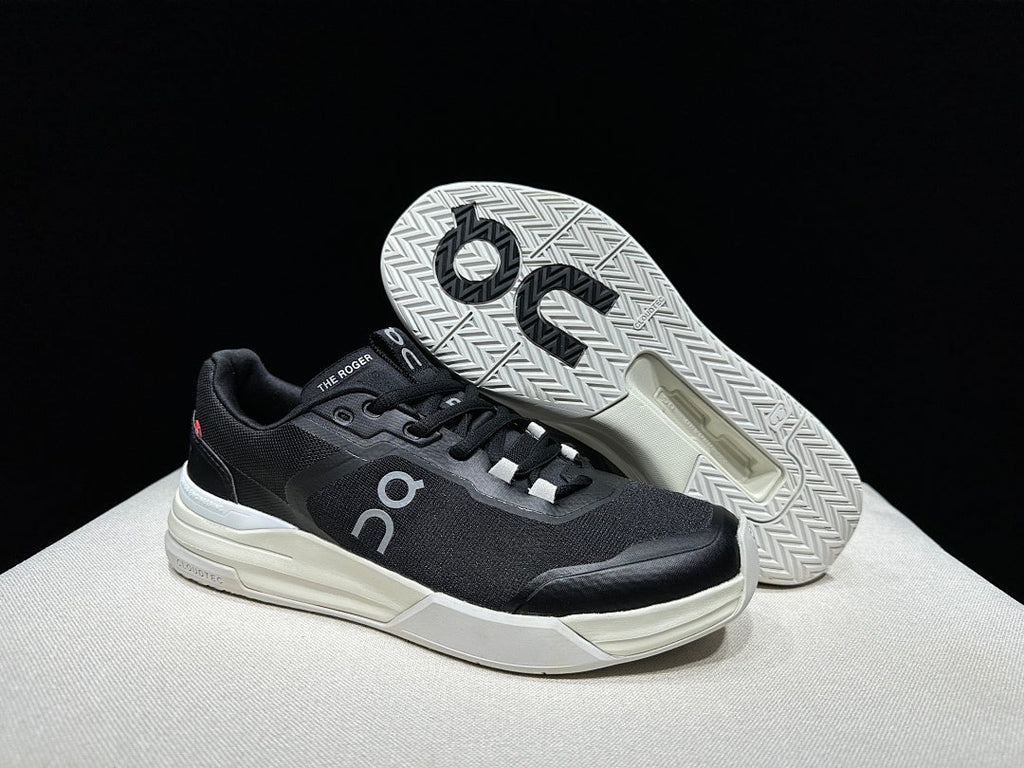 On THE ROGER Clubhouse Pro Tennis Sneakers in Black and White - product image from the listing.
