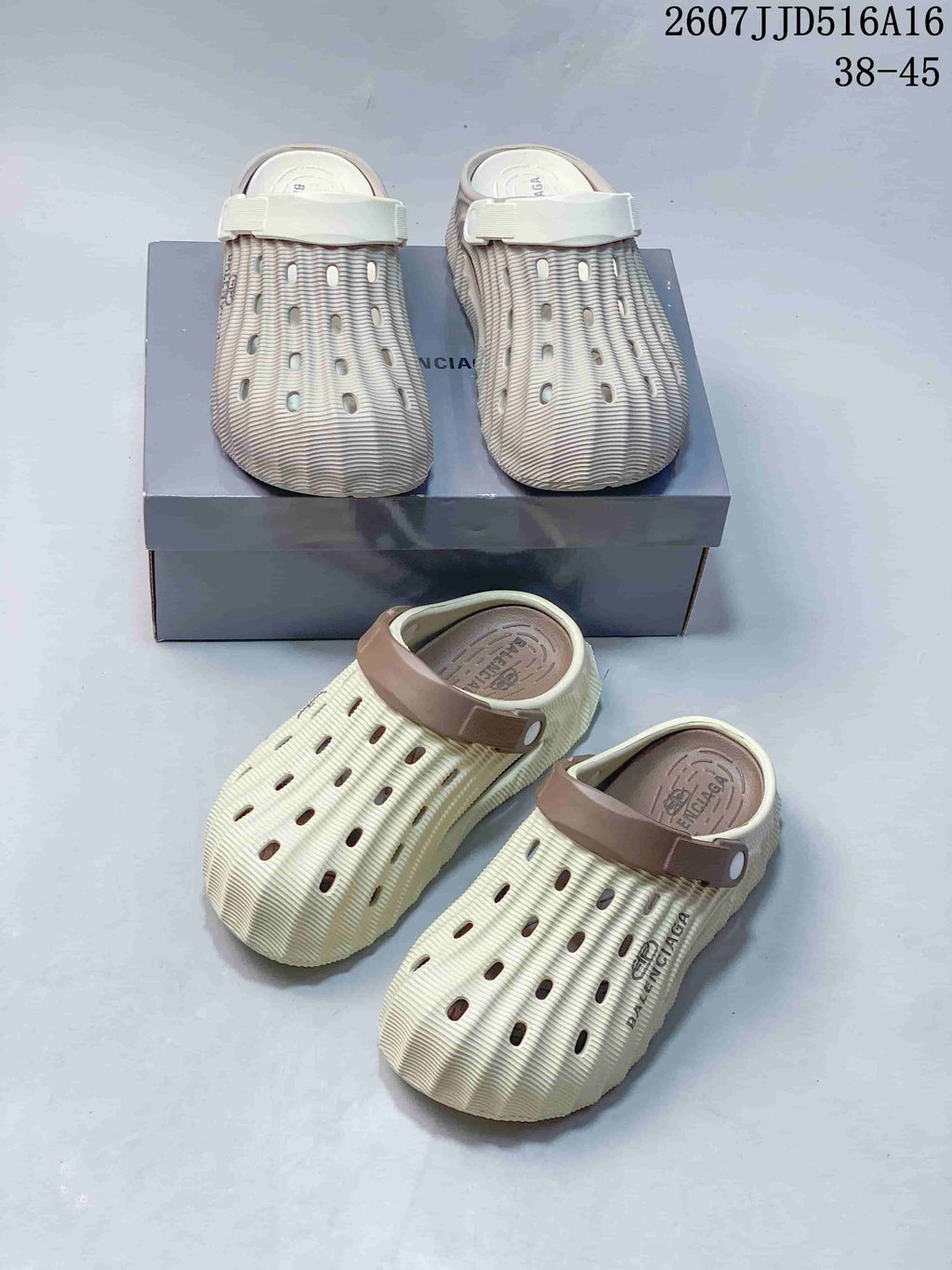 Logo Clog Sandals in Off-White with Brown Strap by Balenciaga - product image from the listing.