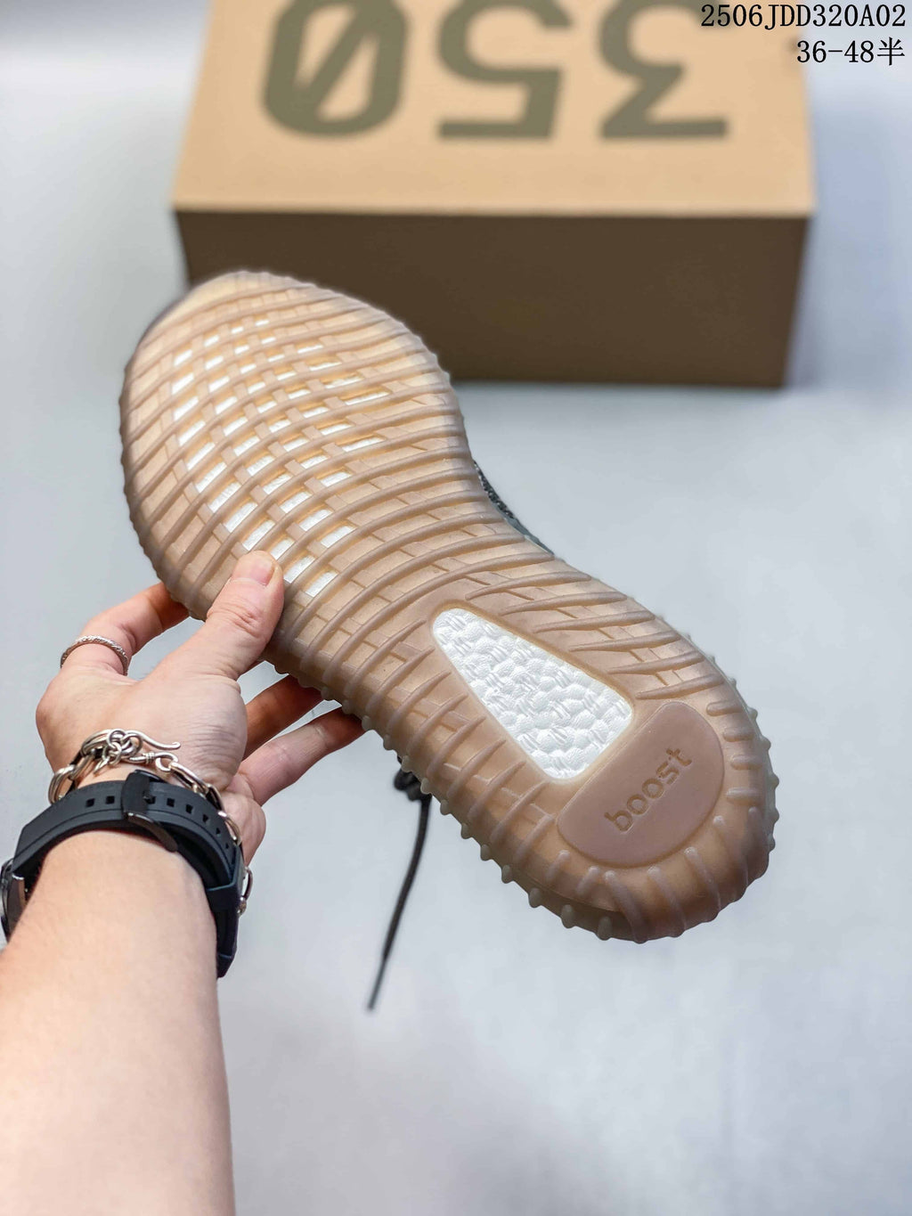 adidas Yeezy Boost 350 Sneakers in Gray Orange - product image from the listing.
