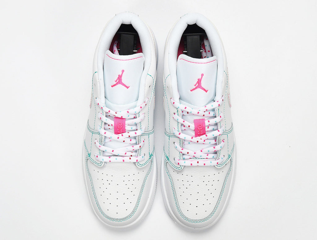 Nike Air Jordan 1 Low Sneakers in White Pink 554723-101 - product image from the listing.