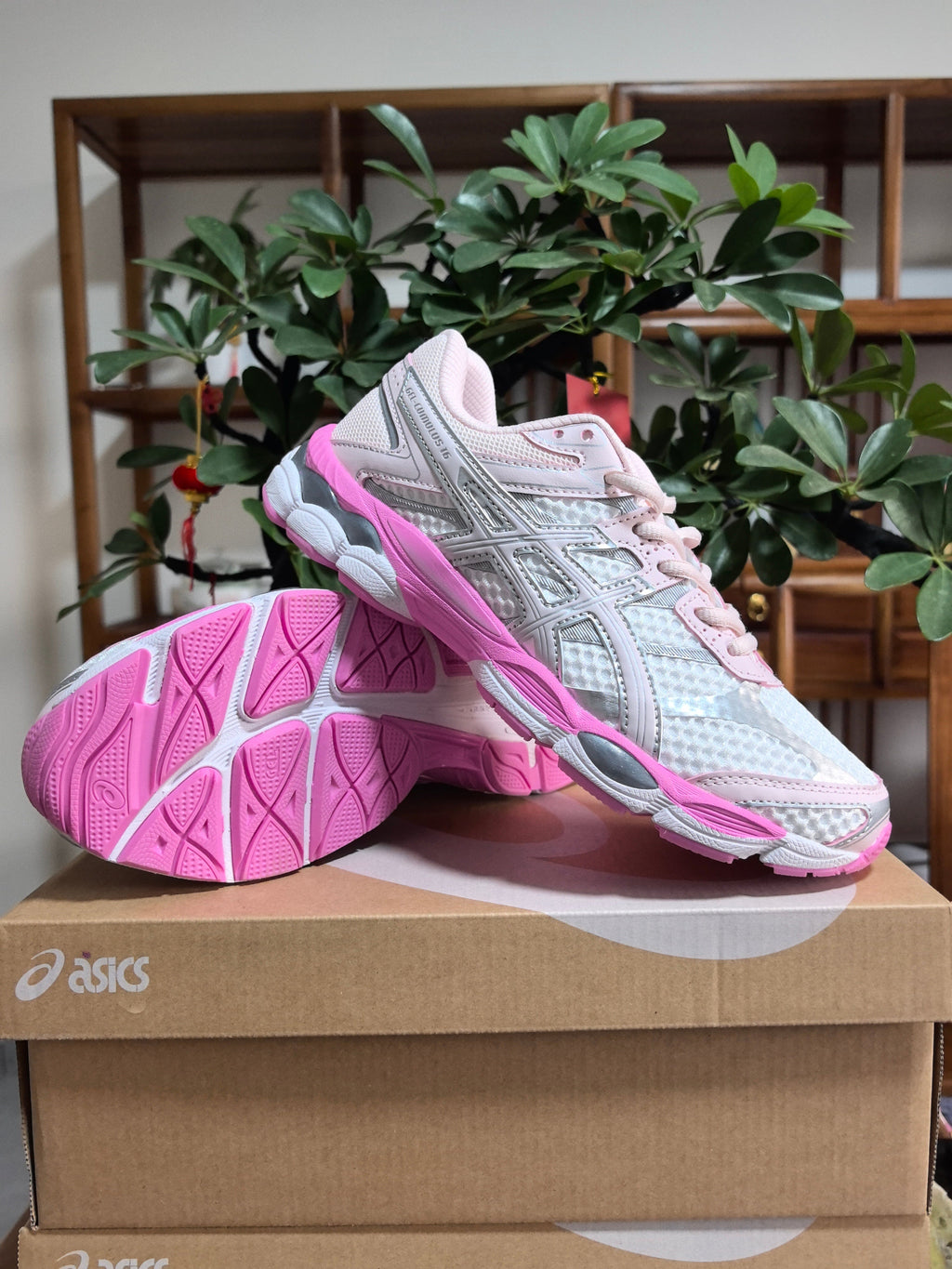 Peach Pink ASICS GEL-Cumulus 16 Sneakers - product image from the listing.