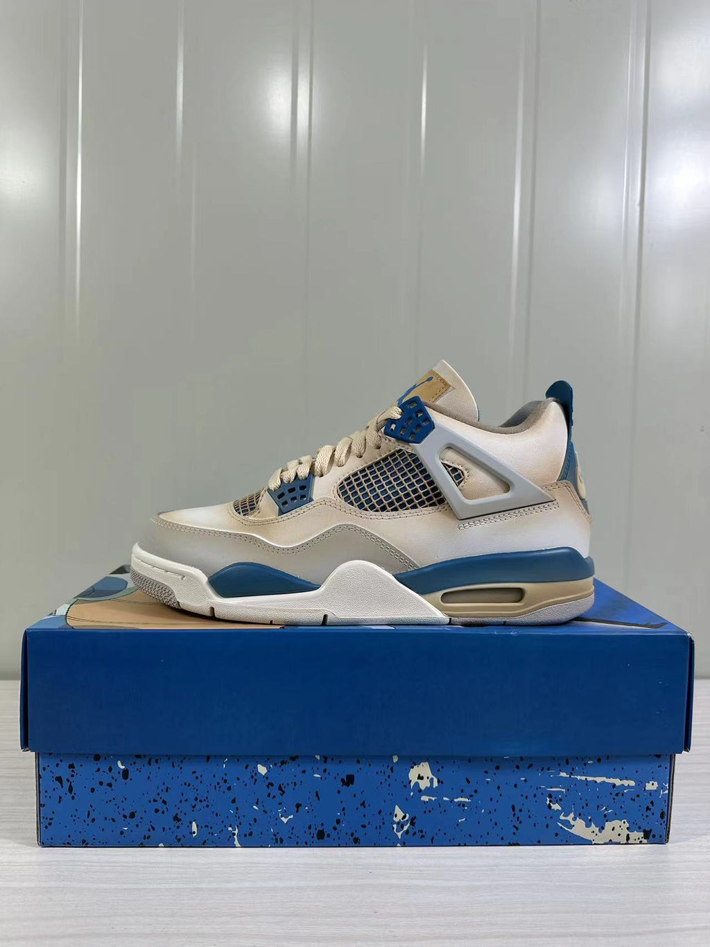 Air Jordan 4 Retro White Blue 308497-105 - product image from the listing.
