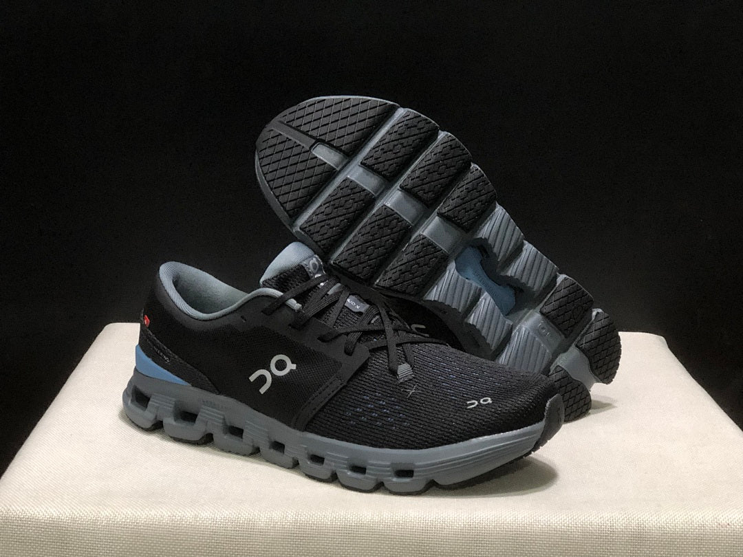 Black and Blue On Cloud X 4 Sneakers - product image from the listing.