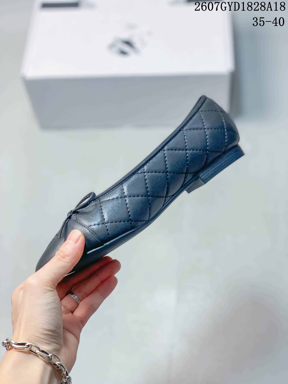 Chanel Quilted Ballet Flats in Black 2607GYD1828A18 - product image from the listing.