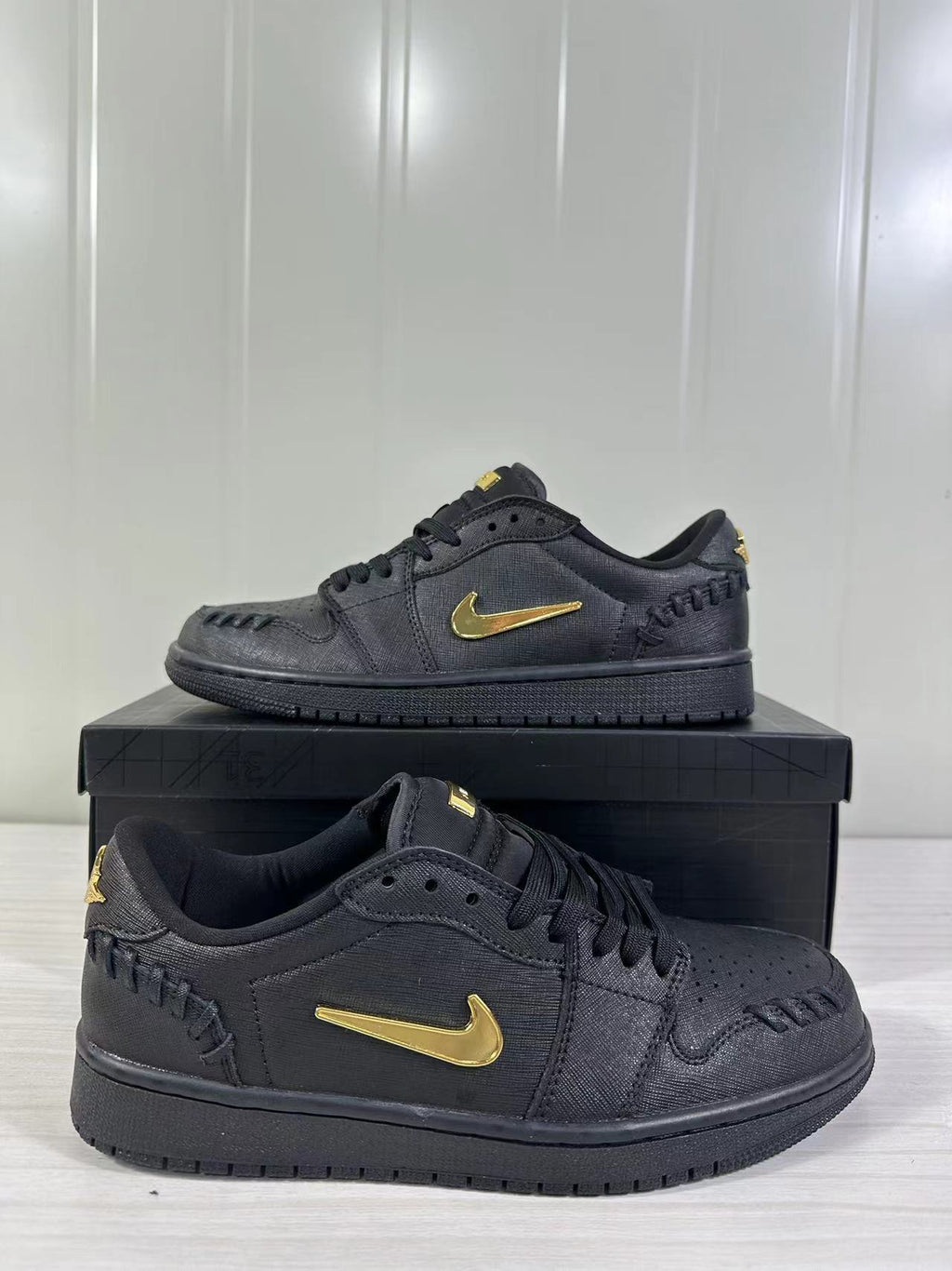 Air Jordan 1 Low Sneakers Black/Gold FN5032-007 - product image from the listing.
