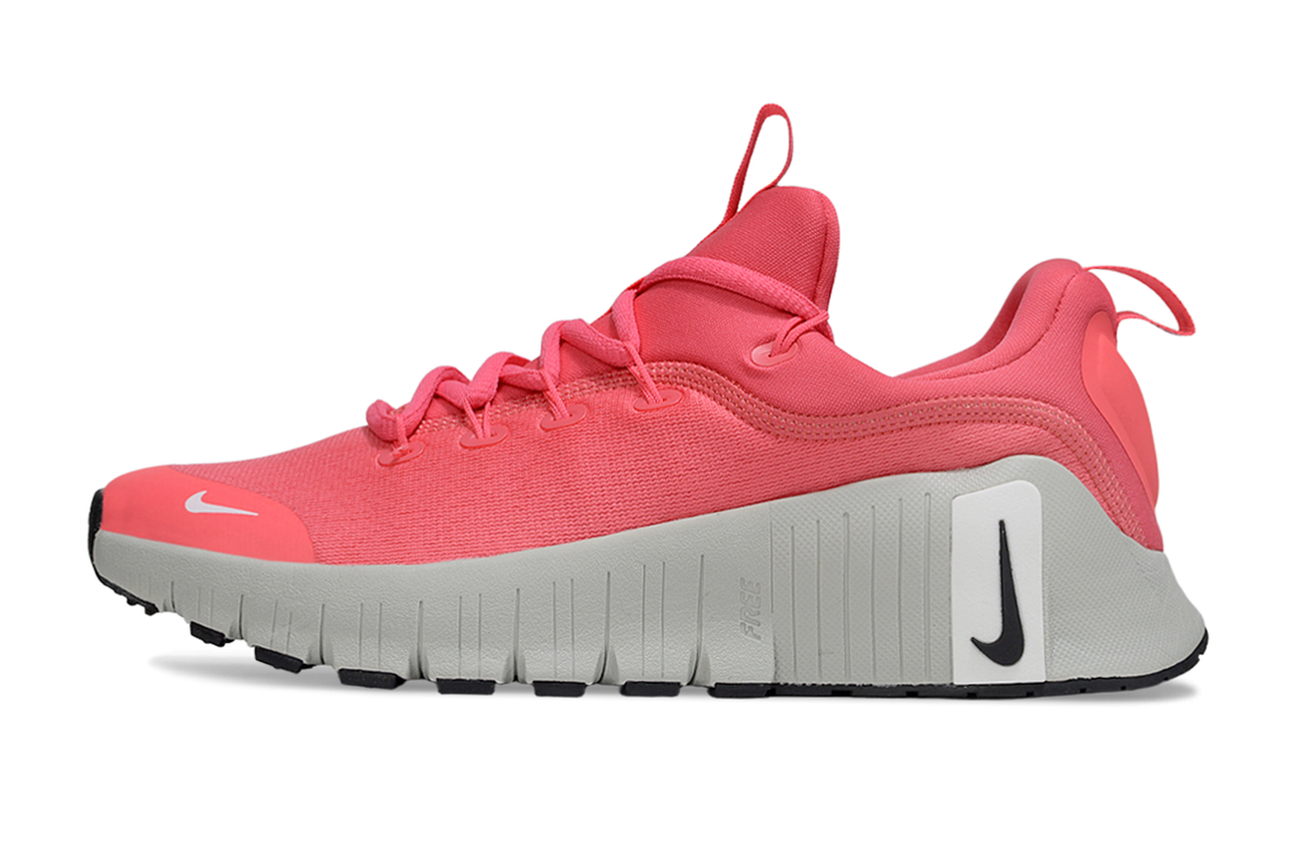 Coral Pink and Gray Nike Free Metcon 5 Sneakers - product image from the listing.